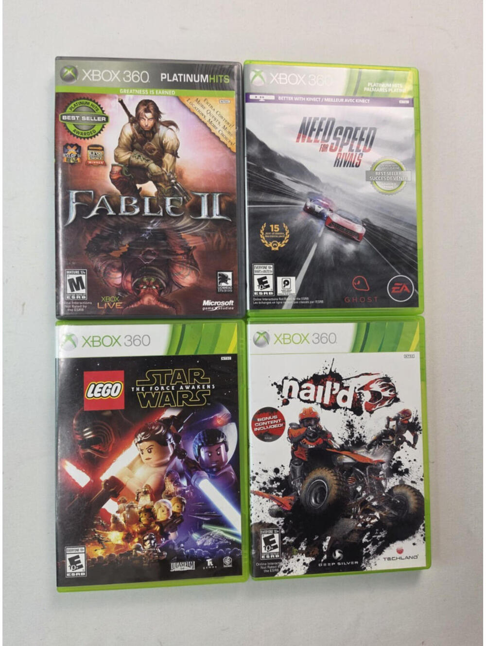 XBOX 360 Lot of 4 Games Lego Star Wars Fable 2 Need For Speed Rivals Nail'd